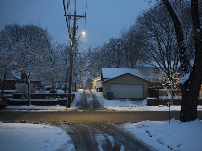 Snow falls in the alley in the Fulton neighbourhood of Minneapolis where Justine Ruszczyk approached a Minneapolis Police Department squad car after reporting a possible sexual assault. Picture: Angus Mordant for News Corp Australia