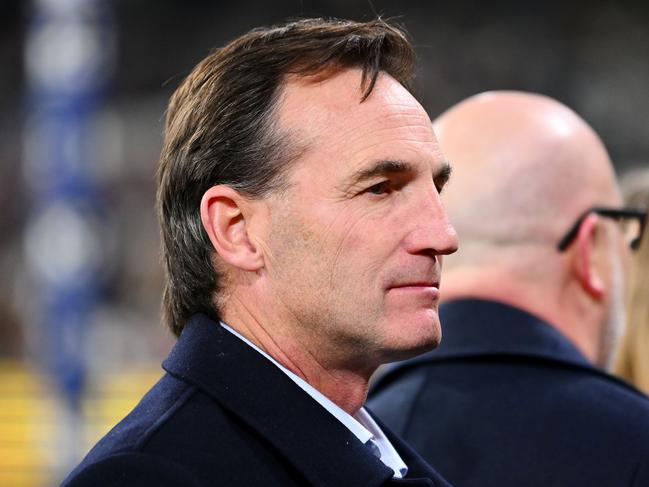 MELBOURNE, AUSTRALIA - MAY 25: AFL CEO Andrew Dillon watches on in the Long Walk during the round 11 AFL match between Richmond Tigers and Essendon Bombers at Melbourne Cricket Ground, on May 25, 2024, in Melbourne, Australia. (Photo by Morgan Hancock/AFL Photos/via Getty Images)