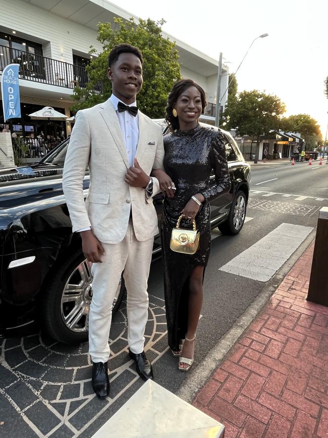 Kemisola Osedimilehn and Emmanuel Adewumi arrive at the formal in a Rolls Royce.