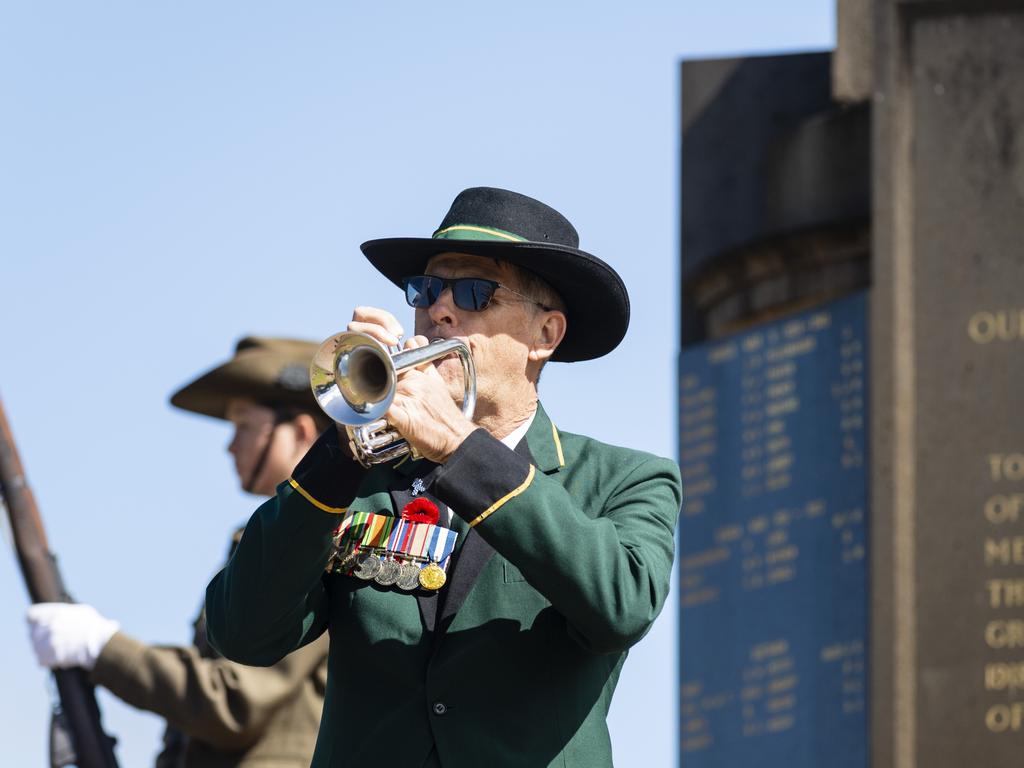 Alan Skerman plays the Last Post at the Anzac Day Toowoomba Mid-Morning Service of Remembrance at the Mothers' Memorial, Tuesday, April 25, 2023. Picture: Kevin Farmer