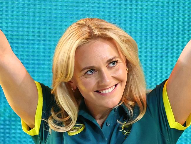 BRISBANE, AUSTRALIA - JUNE 15: Ariarne Titmus waves to the crowd during the Australian 2024 Paris Olympic Games Swimming Squad Announcement at Brisbane Aquatic Centre on June 15, 2024 in Brisbane, Australia. (Photo by Quinn Rooney/Getty Images)