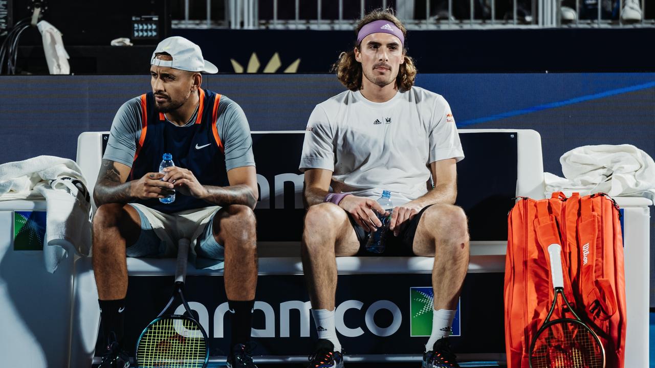 Nick Kyrgios splayed at an exhibition event in Riyadh alongside Stefanos Tsitsipas last year. Picture: Alexander Scheuber / Getty Images