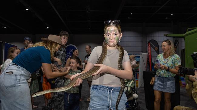 Cammed up, Ellodie Wilson handling a rather large snake. Picture: Pema Tamang Pakhrin