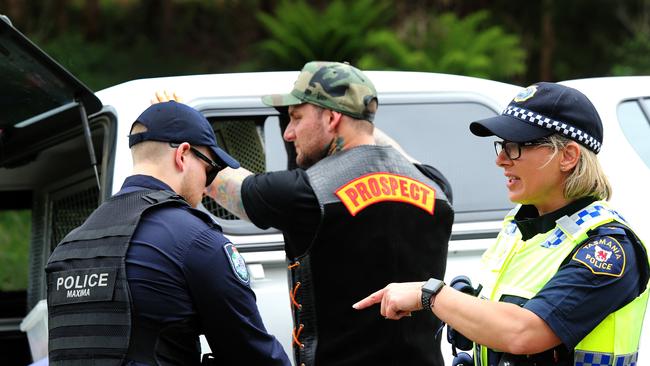 Police keep a watchful eye on the Bandidos' motorcycle gang as they arrive in Burnie in Tasmania's north west. Picture: CHRIS KIDD