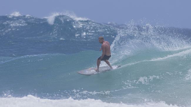 Former World Champion surfer Mick Fanning enjoying the large swell at Snapper Rocks on Sunday 2 January 2022. Picture: Jerad Williams
