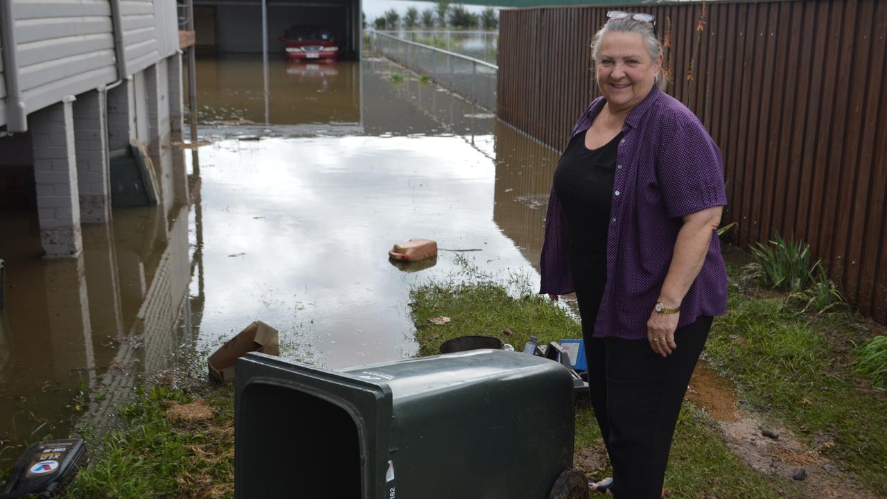 ‘UNSEEN FLOODING’: Real estate agent Helen Harm remains optimistic despite floodwaters coming into her premises on Tuesday night.