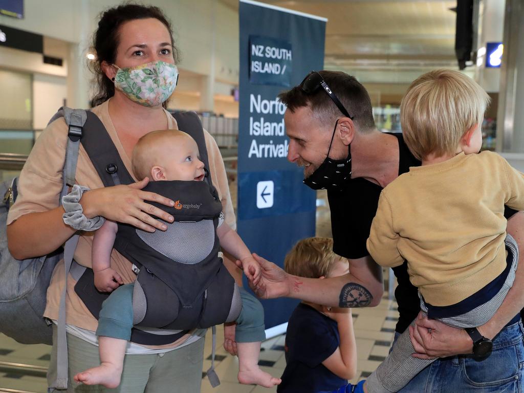 Dad Scottie Phillips is reunited with Torvi, Opi, and Arni, and wife Hannah Butcher. Picture: Adam Head