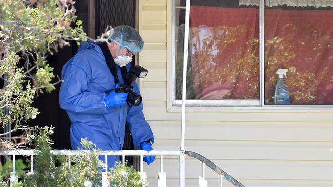 Police at the Cannon Hill home where Khalil Ibrahim died in October last year. Picture: John Gass