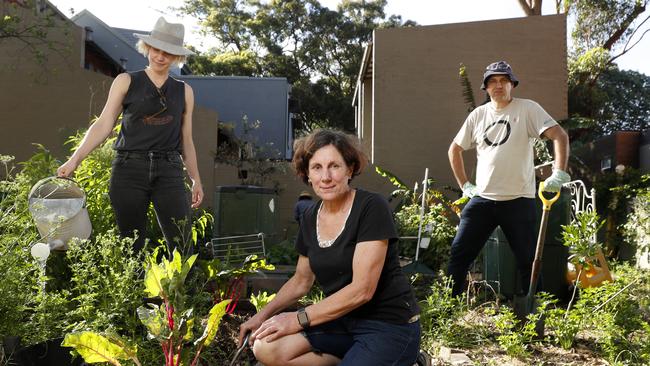 The Erskineville gardeners, pictured, are fighting to keep their veggie patch in a now firey debate. Picture: Jonathan Ng