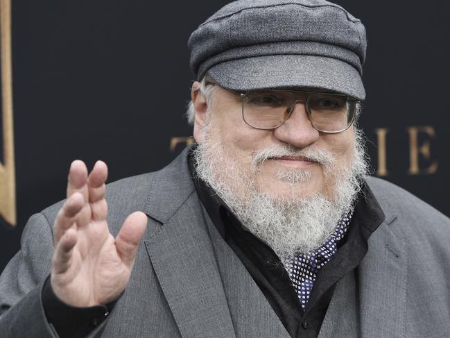 Author George R.R. Martin waves to photographers at the premiere of the film "Tolkien," at the Regency Village Theatre, Wednesday, May 8, 2019, in Los Angeles. The film explores the formative years of J.R.R. Tolkien, author of the classic fantasy novels "The Hobbit" and "The Lord of the Rings." (Photo by Chris Pizzello/Invision/AP)