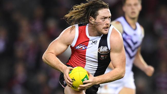 MELBOURNE, AUSTRALIA - AUGUST 11: Jack Steven of the Saints runs with the ball during the round 21 AFL match between the St Kilda Saints and the Fremantle Dockers at Marvel Stadium on August 11, 2019 in Melbourne, Australia. (Photo by Quinn Rooney/Getty Images)