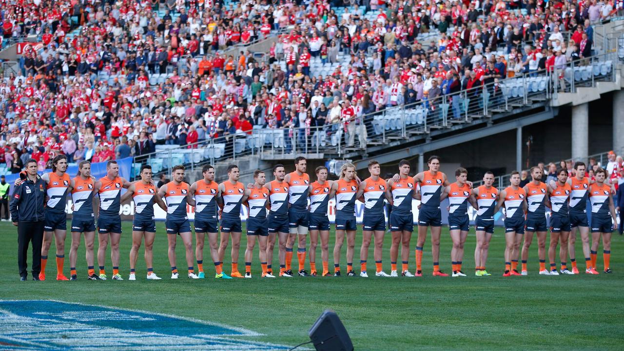 The Giants line up for the national anthem during the 2016 AFL First Qualifying Final. Picture: Michael Willson
