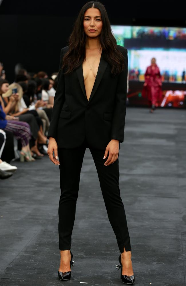 Jessica Gomes wearing a figure-hugging Saint Laurent tuxedo during the international segment of the parade. Picture: Jonathan Ng