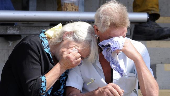 Powerline failure: The real cost of powerline failures was captured in the faces of grieving families at Kilmore Racecourse in 2009, in the wake of Black Saturday’s fires.