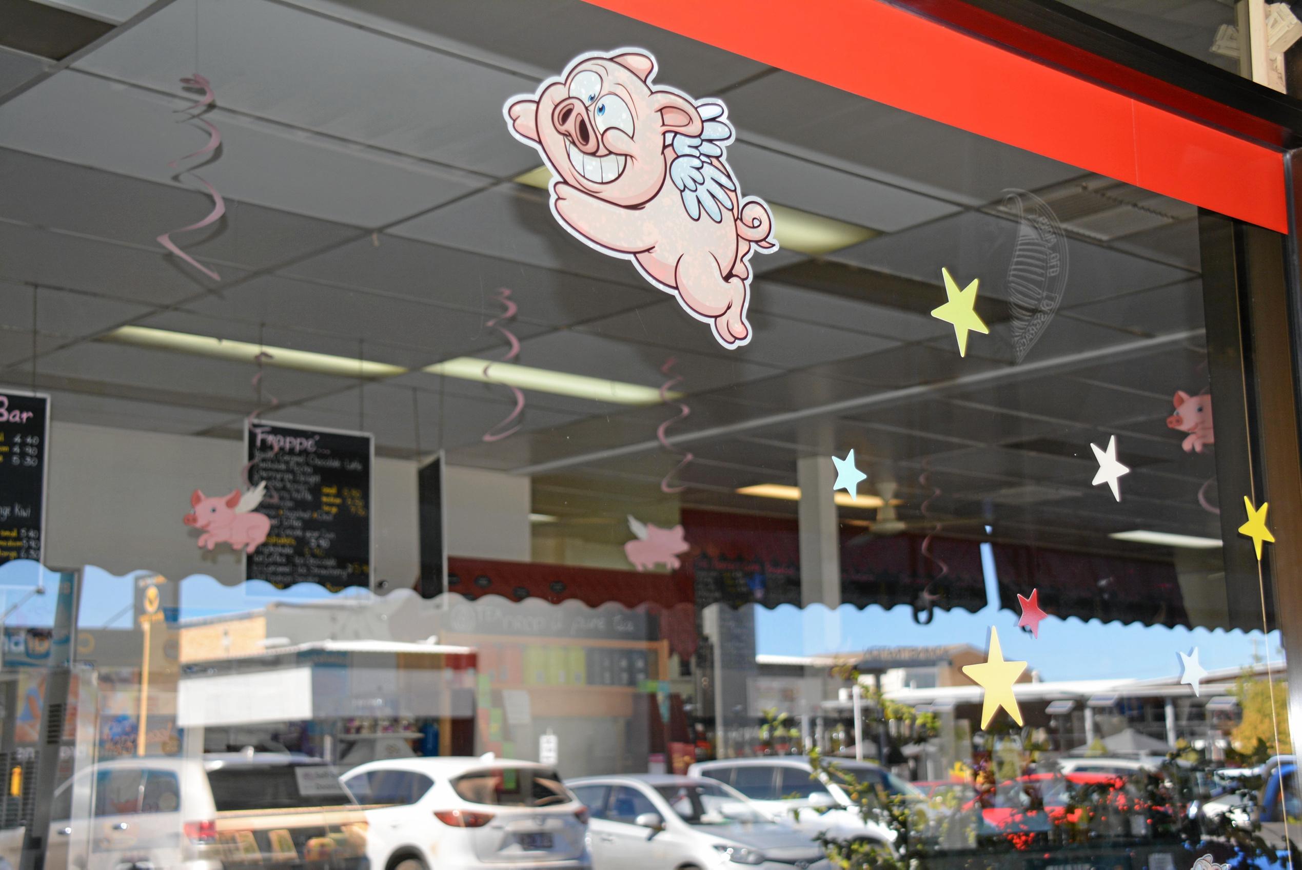 Glendon St Cafe have proved pigs really can fly with their BaconFest Street window display for BaconFest. Picture: Jessica McGrath