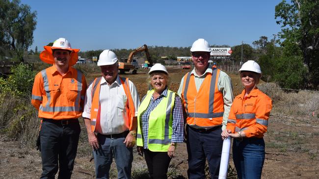 Capricornia MP Michelle Landry, Flynn MP Ken O'Dowd and Rockhampton MP Barry O'Rourke standing where the newly built road will soon open to traffic.