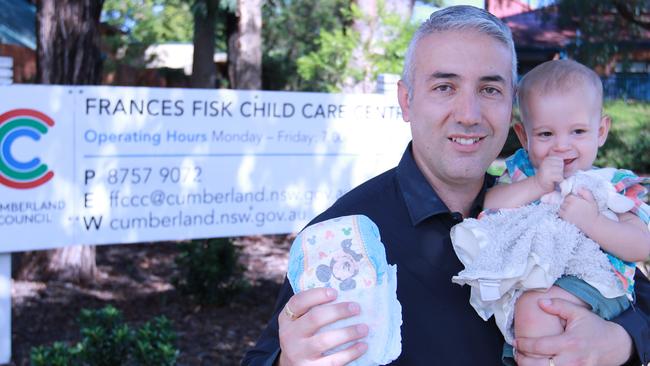 Cumberland Mayor Steve Christou with baby Hunter at Frances Fisk Childcare Centre at Granville.