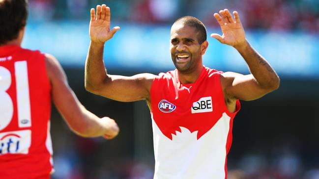 Former Sydney star Michael O’Loughlin celebrates with ex-teammate Brett Kirk during a game in 2008. Picture: Phil Hillyard