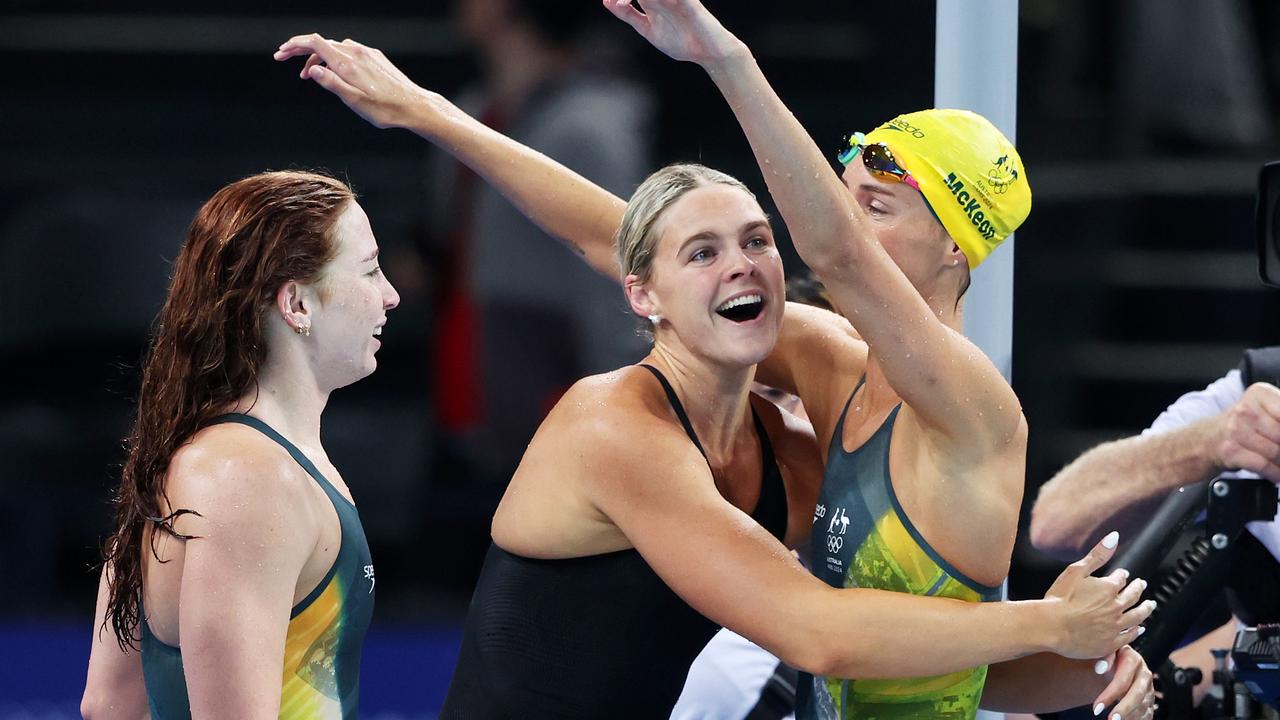 Mollie O'Callaghan, Shayna Jack and Emma McKeon of Team Australia celebrate after winning gold in the Women's 4x100m Freestyle Relay Final. Photo by Sarah Stier/Getty Images.