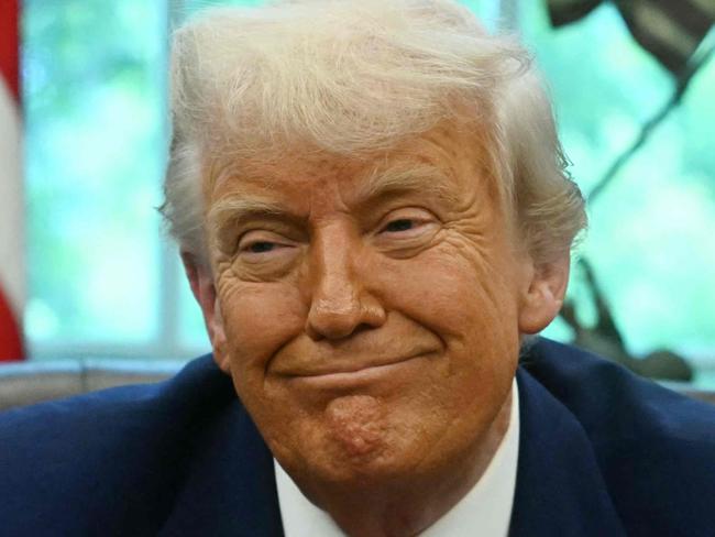US President Donald Trump listens during an announcement about the Golden Dome missile defense shield, in the Oval Office of the White House on May 20, 2025, in Washington, DC. (Photo by Jim WATSON / AFP)
