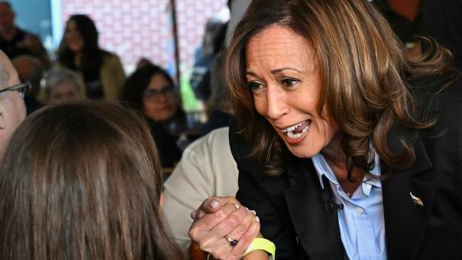 Kamala Harris works the room of union members in Pittsburgh. Picture: AFP