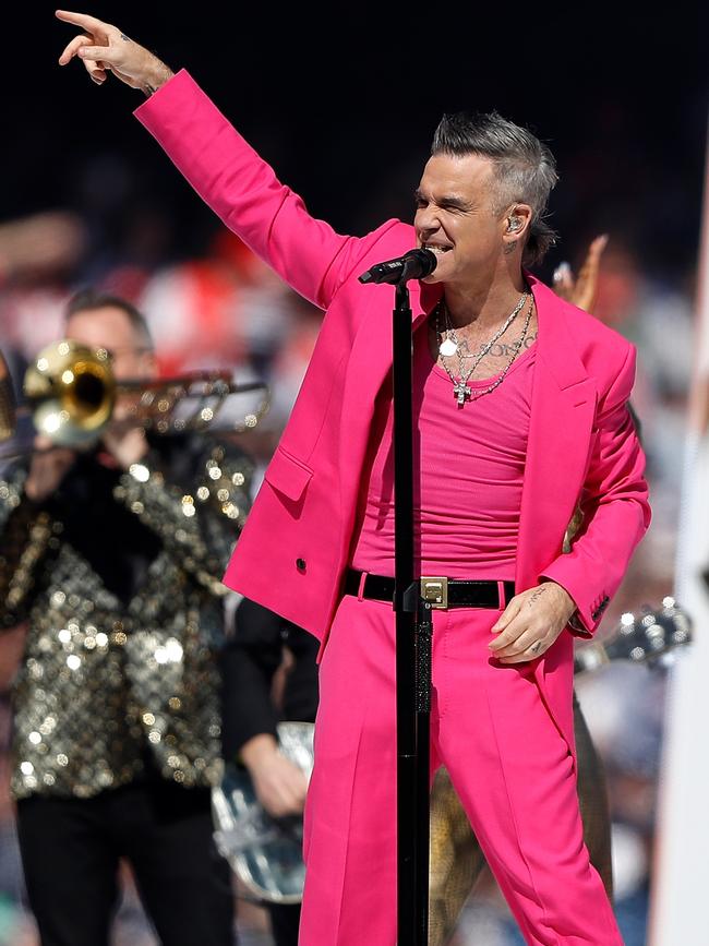 Robbie Williams performing during the 2022 Toyota AFL Grand Final match between the Geelong Cats and the Sydney Swans at the Melbourne Cricket Ground on September 24, 2022. Picture: Dylan Burns/AFL Photos