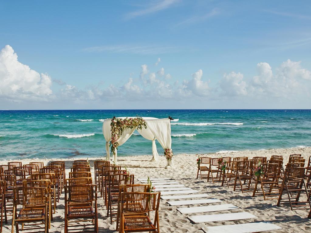 The guests are expected to sit through a timeshare presentation despite paying to attend the overseas wedding.