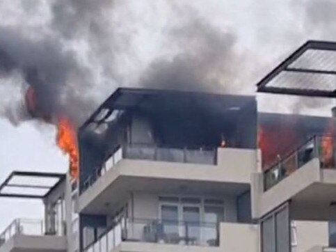 A resident has been severely burnt after a top-floor unit caught fire in Sydney’s northwest., About 3:30pm emergency services raced to the scene after reports of a fire at an apartment block on Angus St, Meadowbank. Must Credit: TNV