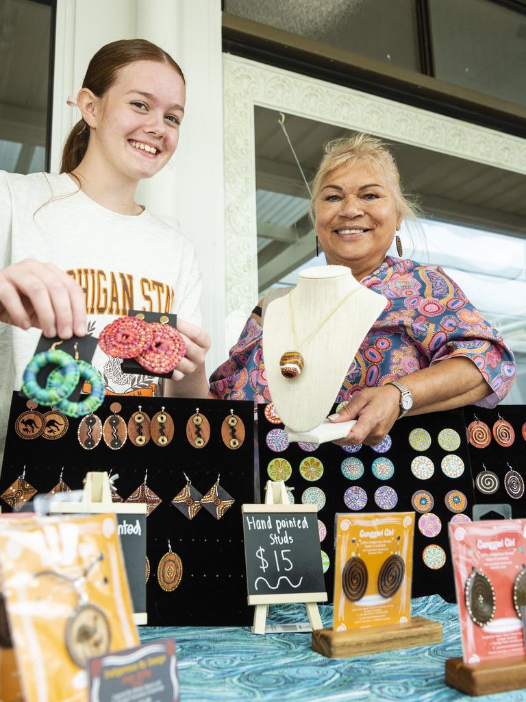 Ailie-Ciaan Englart (left) with her handmade earings and Judy Kirby of Indigenous By Design incorporating Gunggari Girl Designs at their stall at the Indigenous Artisan Markets at The Lighthouse, Saturday, December 17, 2022.