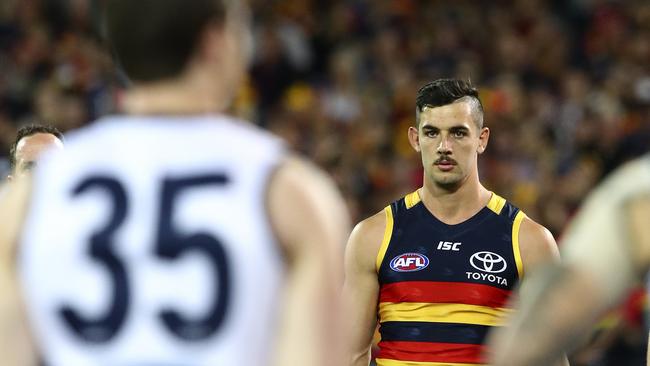 Taylor Walker tries to stare down Patrick Dangerfield with the power stance during last year’s finals series. Picture Sarah Reed