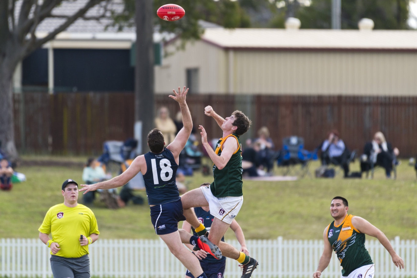 Carl Stevenson (left) for Coolaroo and Aiden Doolan of Goondiwindi in AFL Darling Downs round one at Rockville Oval, Saturday, July 11, 2020. Picture: Kevin Farmer