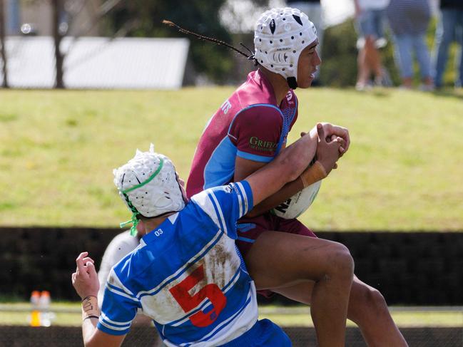 DAILY TELEGRAPH AUGUST 16, 2023Hills Sports High (maroon) versus St Dominics in the NRL School Boys Competition at Windsor today. Pictured is Naioia Tofaeono catching the ball. Picture: David Swift.