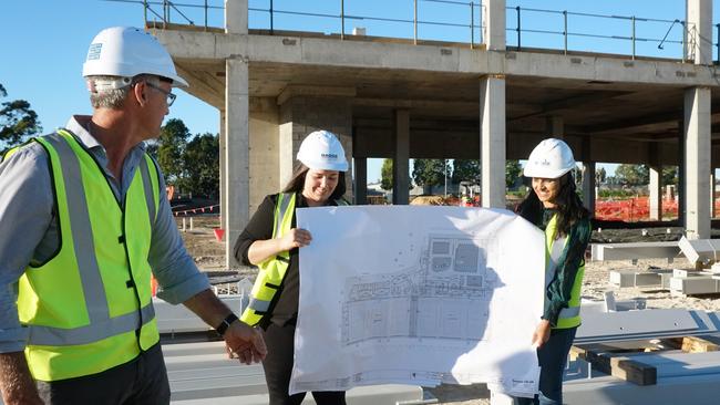 BADGE senior construction manager Mark Wyatt, site clerk Jocelyn Patzel and site engineer Princi Tandel explain the plans for Mount Gambier's multimillion dollar Wulanda Recreation and Convention Centre. Picture: Jessica Ball