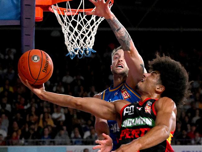 BRISBANE, AUSTRALIA - NOVEMBER 18: Tai Webster of the Wildcats takes on the defence of Nathan Sobey of the Bullets during the round eight NBL match between the Brisbane Bullets and Perth Wildcats at Nissan Arena, on November 18, 2023, in Brisbane, Australia. (Photo by Bradley Kanaris/Getty Images)