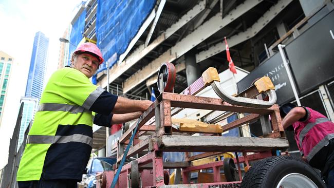 Sub-contractors and tradesmen pack up their equipment and walk off the 443 Queens Street construction site in Brisbane’s CBD after building giant Probuild’s financial collapse. Picture: NCA NewsWire / Dan Peled