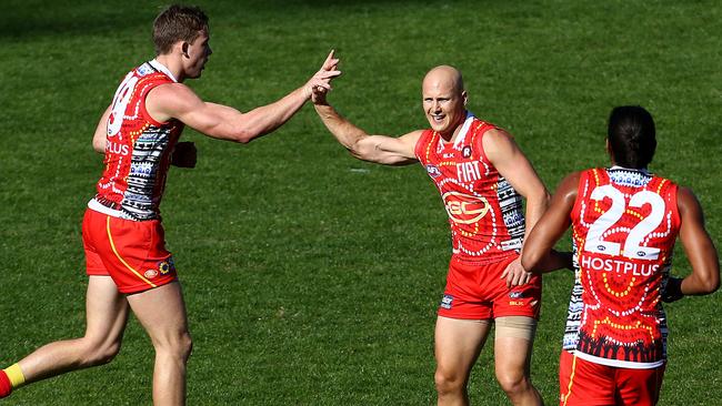 Tom Lynch and Gary Ablett. Pics Adam Head