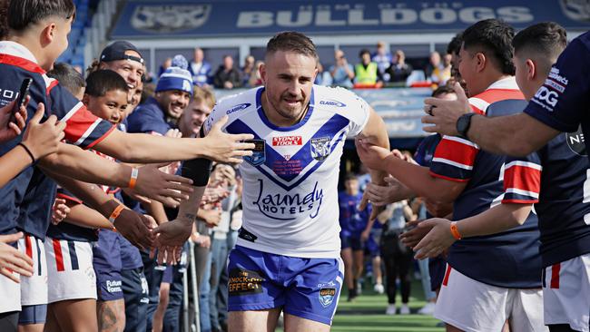 Josh Reynolds running out for the last time. Picture: Adam Yip