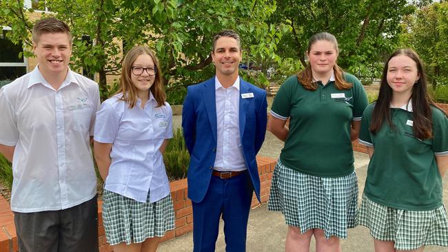 Captains Harry Hansen, Steph Harwood, Chantelle Sandy and Brea Whitford with principal, Chris Quinn. Picture: Brooke Taylor