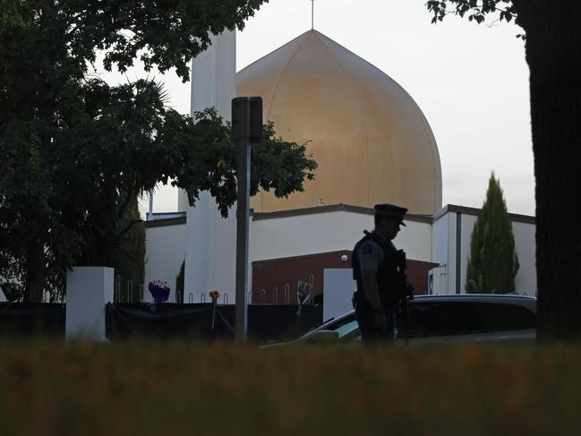 A police officer stands guard in front of the Al Noor mosque in Christchurch. Picture: AP