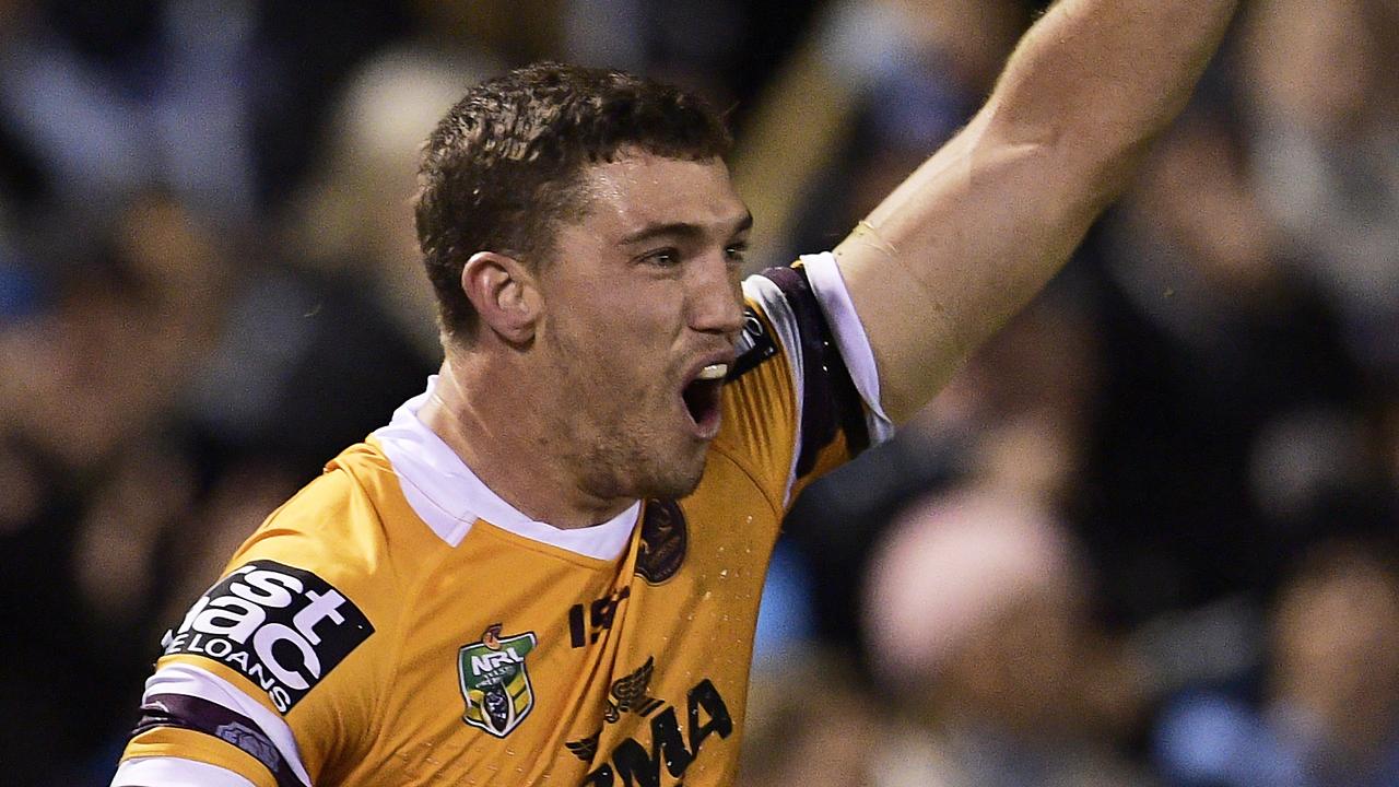 Corey Oates scores for the Broncos.