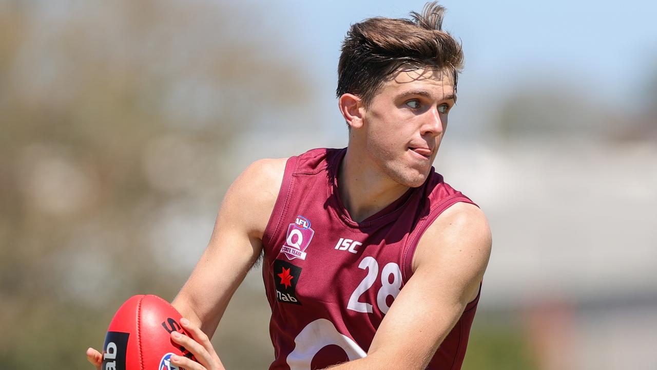 Liam Hude of Queensland carries the ball during the AFL U17 Championship match between Queensland and Tasmania at Yeronga on September 24, 2021 in Brisbane, Australia. (Photo by Russell Freeman/AFL Photos)