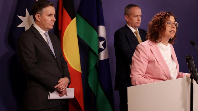 Health Minister Mark Butler, left, and NDIS Minister Bill Shorten, back right, listen as Social Services Minister Amanda Rishworth speaks on Wednesday in Sydney on the disability royal commission’s recommendations. Picture: AAP