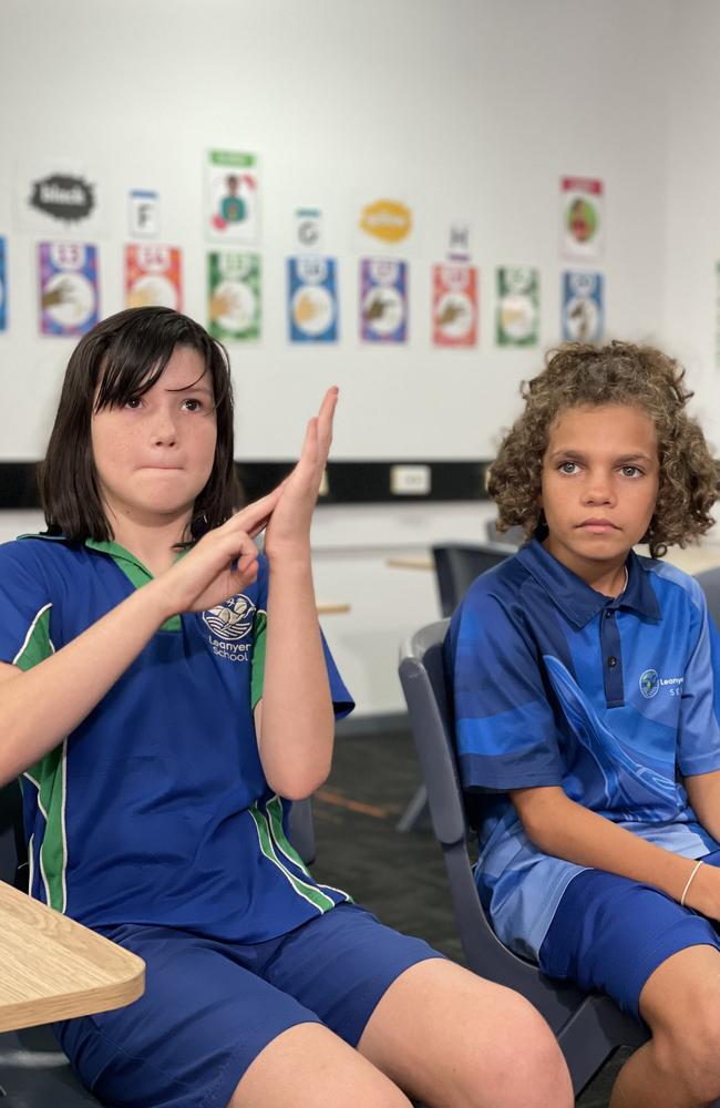 For students like Sophie (left) who are deaf, Leanyer School's move to teach Auslan sign language to all students has been life-changing. Picture: Annabel Bowles