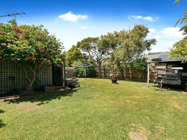 The home has a spacious backyard.