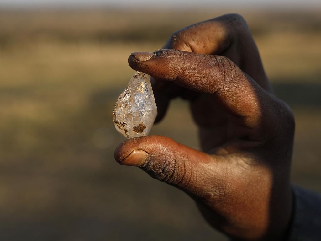 Experts do not rule out the possibility that they are genuine diamonds, although they consider this highly unlikely. Picture: Phill Magakoe/AFP