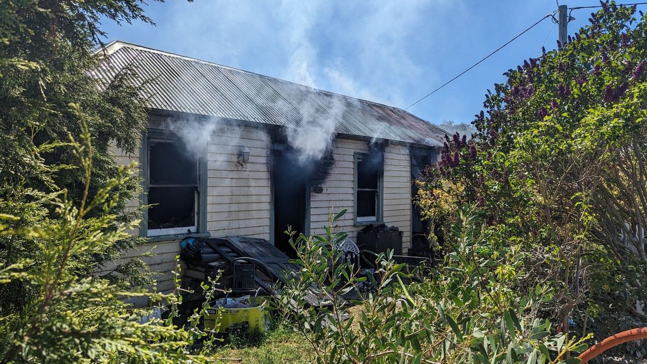 Tasmania Fire Service and Tasmania Police at the scene of a house fire at Sorell St, Bridgewater. Photo: Alex Treacy