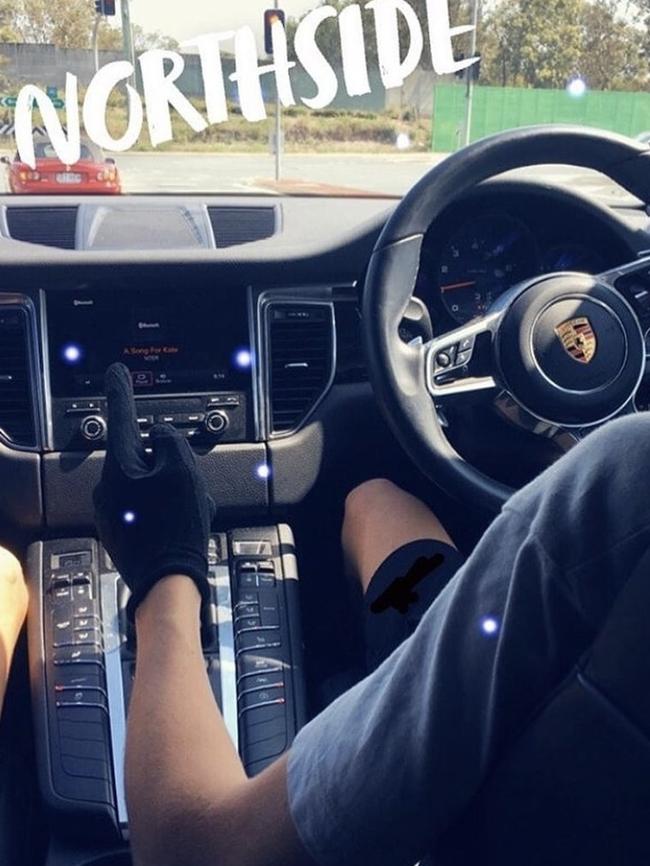 A member of the Northside Gang during a joyride in a Porsche. Picture: Instagram