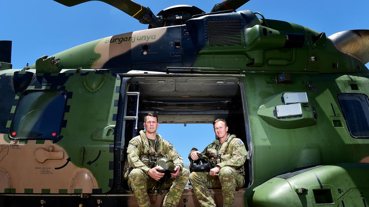 CAPT Leon Botham and SGT Kieran Dan in a MRH-90 Taipan at Townsville RAAF Base. Picture: Shae Beplate.