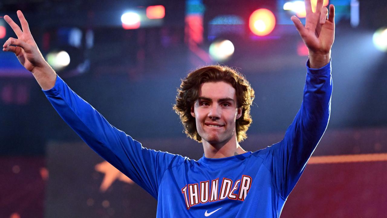 CLEVELAND, OHIO - FEBRUARY 18: Josh Giddey #3 of the Oklahoma City Thunder waves to the crowd during the 2022 Clorox Rising Stars at Rocket Mortgage Fieldhouse on February 18, 2022 in Cleveland, Ohio. NOTE TO USER: User expressly acknowledges and agrees that, by downloading and/or using this Photograph, user is consenting to the terms and conditions of the Getty Images License Agreement. (Photo by Jason Miller/Getty Images)