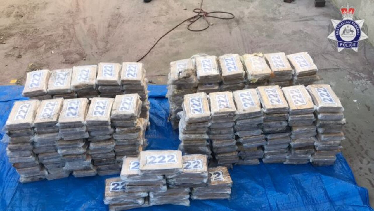 Two men have appeared in court after police services seized an estimated $61m worth of cocaine from a yacht in Townsville.